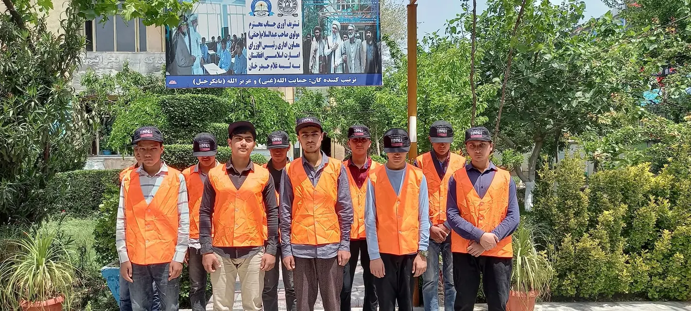 Students on duty in orange vests