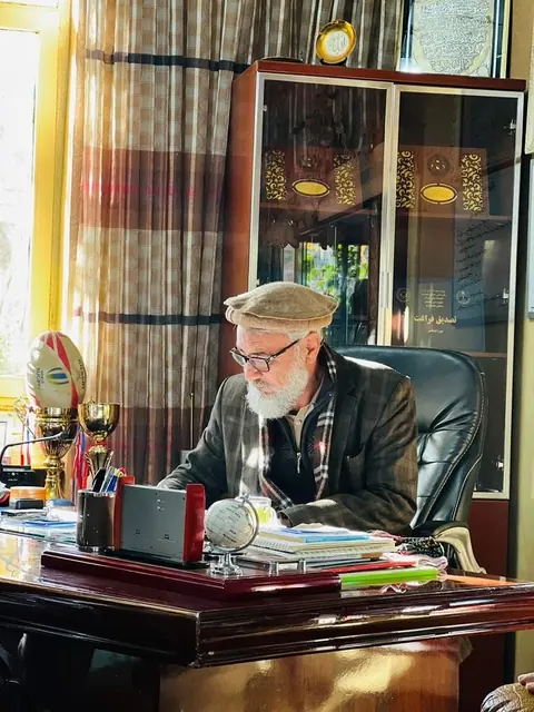 A staff member working at a desk