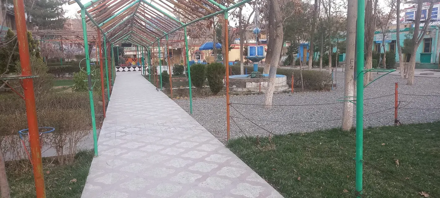 A paved walkway through the school grounds